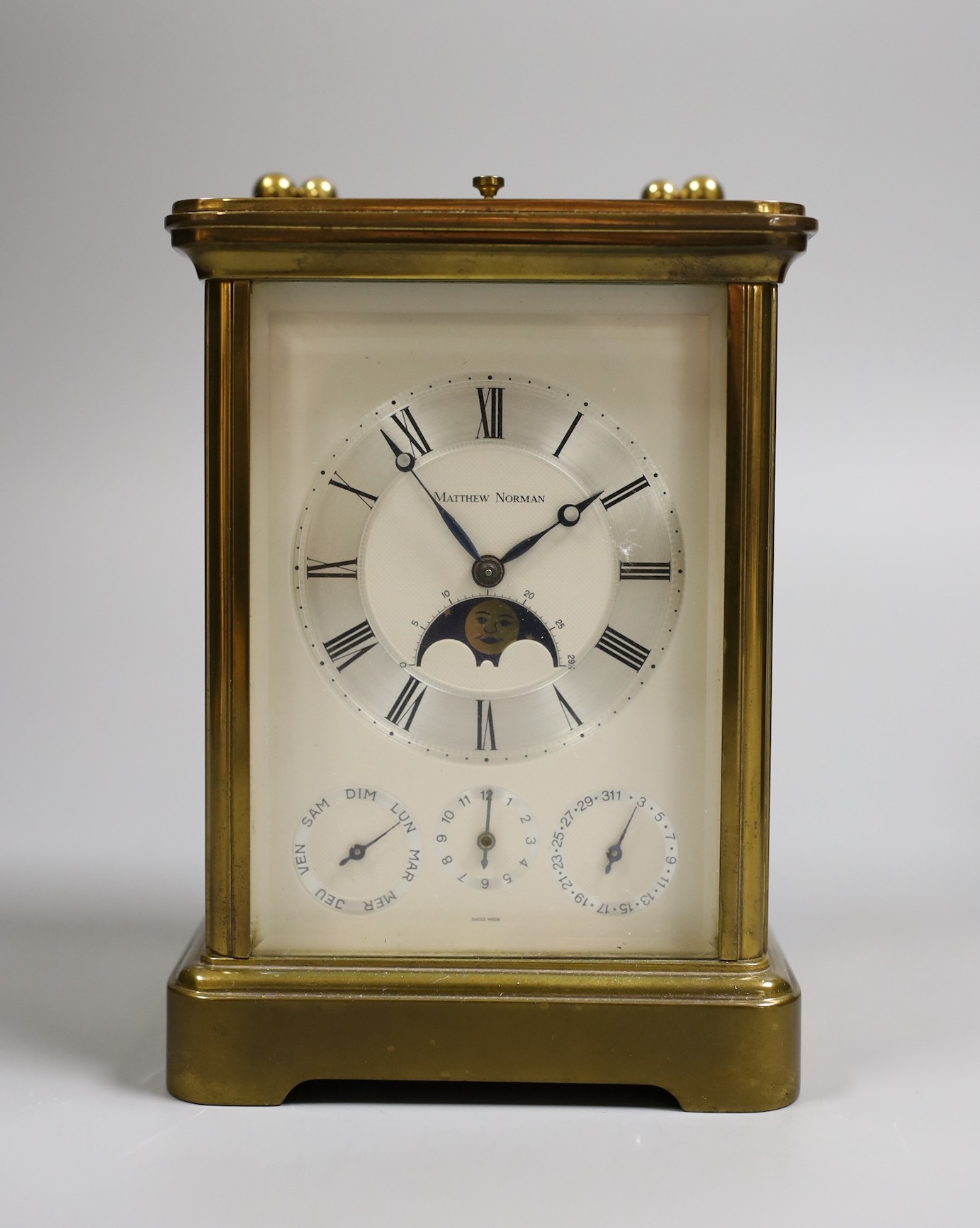 Matthew Norman brass carriage calendar clock and case, 13 cms high not including box